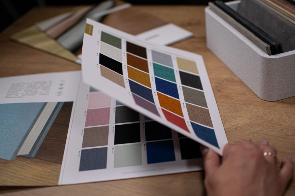 Linen swatch cards on the workshop table